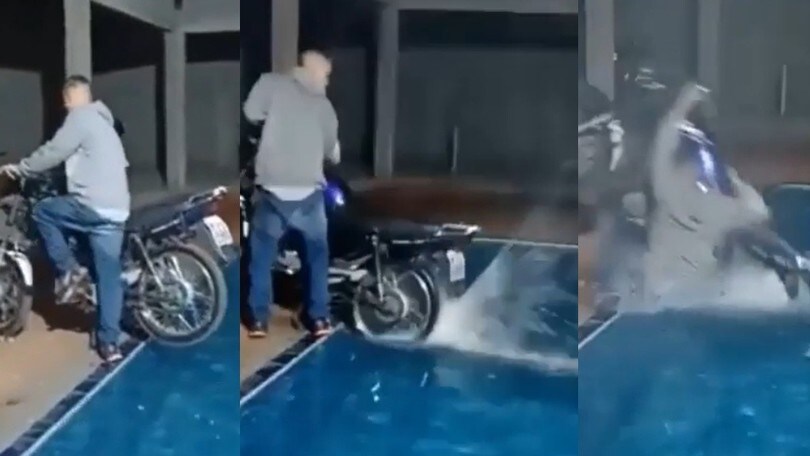 Si diverte a bordo piscina con la moto, ma finisce per cadere in acqua!