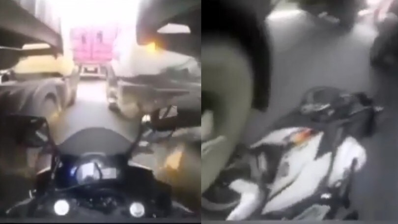 Sorpasso folle: moto incastrata tra 2 camion ma pilota illeso