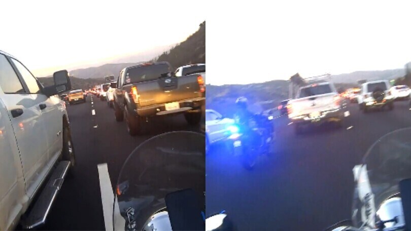 Auto tenta di far cadere un motociclista, ma... il finale è inaspettato