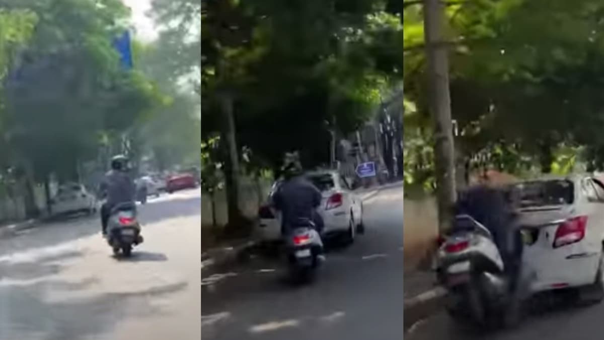 Scooterista distratto si schianta contro un taxi: guardava le moto...