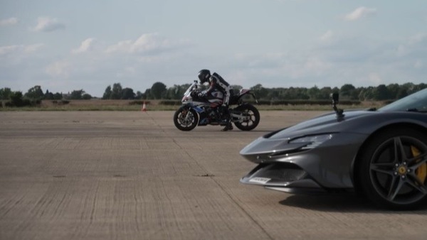 BMW M 1000 RR: sfida in pista a una Ferrari SF90