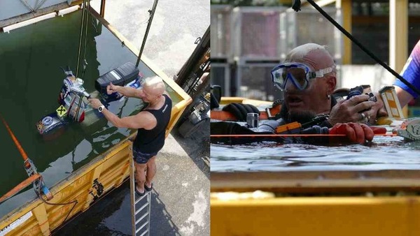 Guinness da brivido, rischia la vita per smontare una Vespa sott'acqua